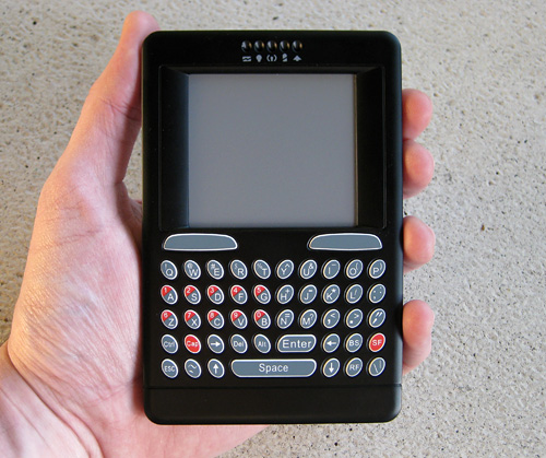Unisen Handheld Keyboard & Mouse Touchpad (Image property of OhGizmo!)