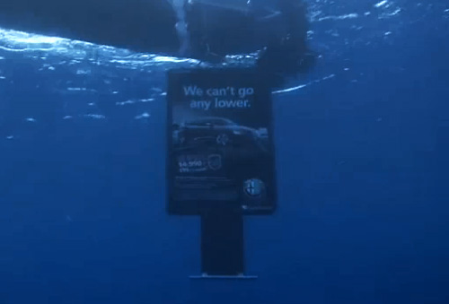 Alfa Romeo's "We can't go any lower" Ad Campaign (Image courtesy Alfa Romeo)