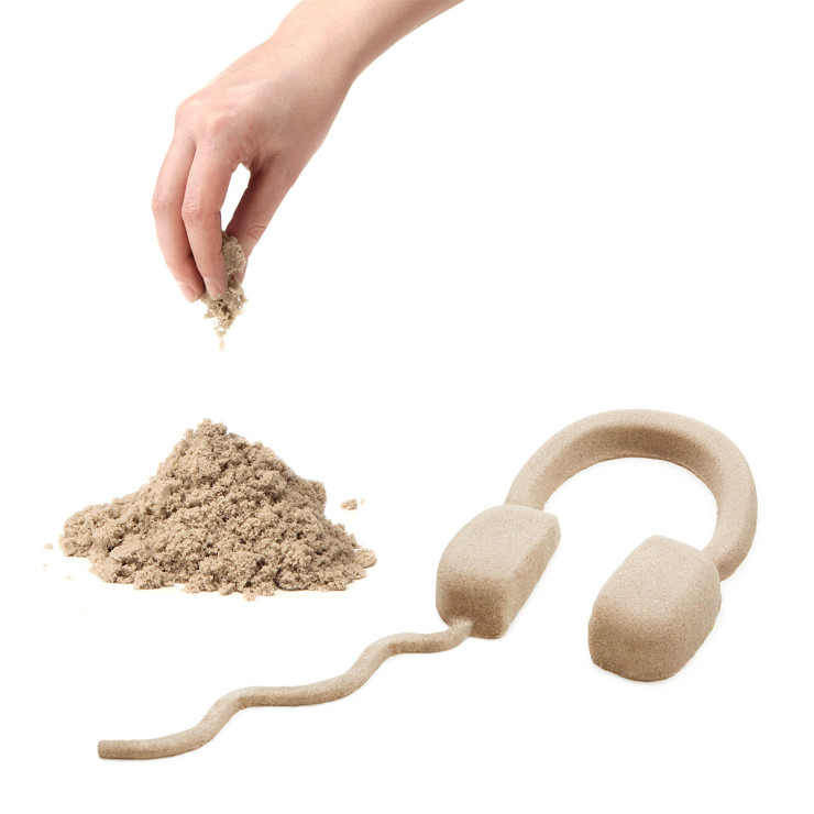 kinetic sand sticks to