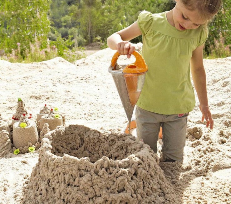 this-sand-funnel-mixes-water-and-sand-to-create-sand-structures-0